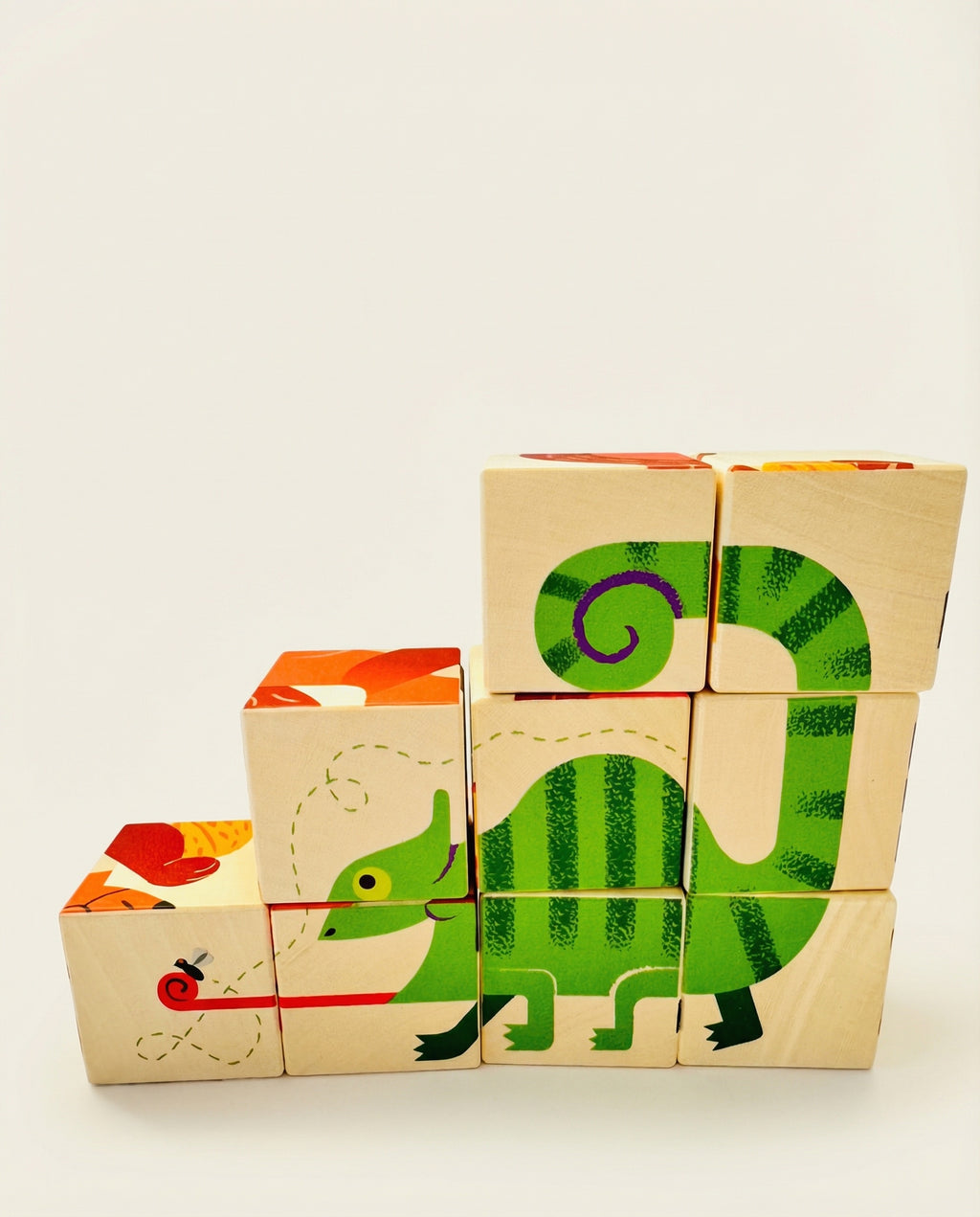 Stack of wooden blocks with colorful animal illustrations on a white background